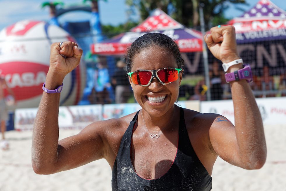 female volleyball player celebrating a championship win